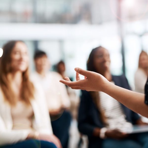 Cropped shot of a businesswoman delivering a speech during a conference